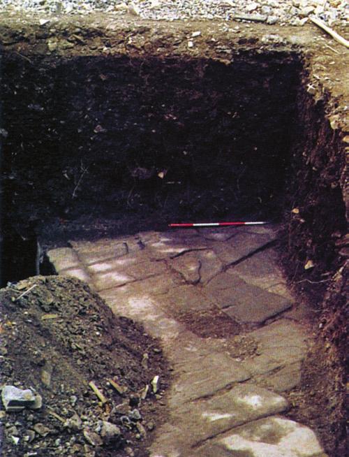 8a A view of a discovered section of Roman pavement - the western segment, during the archaeological exploration of Hercules Gate in 1997-1998 (Starac, 2001, exhibition catalogue, photo from page 27).