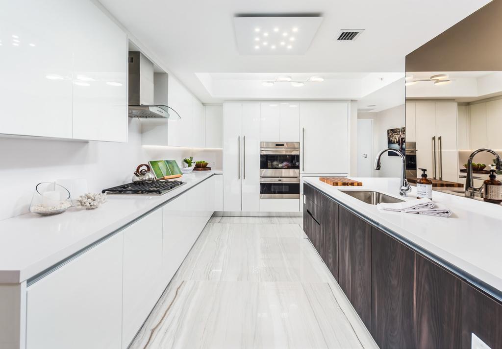 LUXURIOUS FINISHES Elegant kitchens embrace contemporary life with ample space for open living and entertaining.