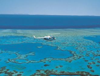 (seasonal) Cost: $399 per person HEART REEF & WHITEHAVEN STOPOVER This tour offers a fabulous scenic flight by helicopter over the Whitsunday Islands, The world famous Great Barrier Reef, Heart reef