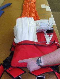 Tapered Flat Packing Instructions Step T1 Follow Steps 1-4 on page 16 under 360 / 425 / 490 BACK PARACHUTE; then take each side of folded canopy and fold again past center.