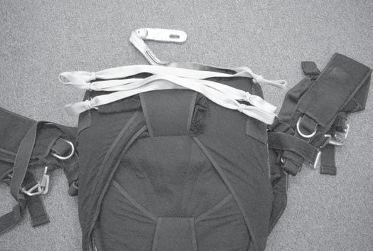 Make the first stow with only one fold of the static line and rubber band wrapped very tight