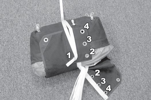 TV3 DUAL BAG STATIC LINE MAIN CLOSING S - fold the canopy, making sure the slider grommets remain seated against the slider stops.
