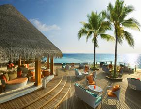 Relax by the poolside setting overlooking the breath taking beauty of the ocean.