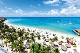 Palm Beach In brief Holidays to Palm Beach bring you to the number 1 tourist destination on the island of Aruba.