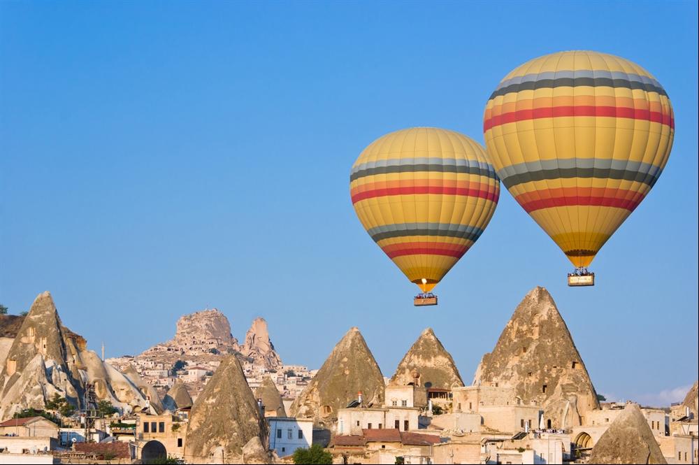 A private guide will drive you to see the amazing fairy chimneys of Cappadocia, and to visit the beautiful examples of Byzantine art in the rock-cutted open air monasteries of Goreme, each with their
