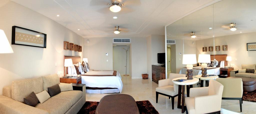 PRESIDENTIAL SUITE Our spectacular Presidential Suite features a 180-degree terrace that overlooks the Caribbean Sea, the Nichupte Lagoon and the