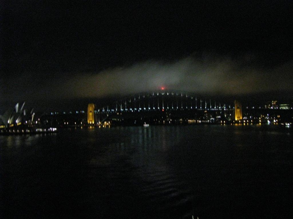 he Harbour Bridge, the Opera House and the harbour itself glowed in