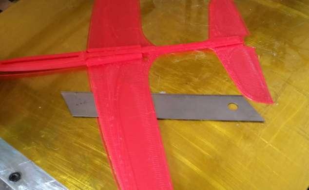 . Use a spatula or similar tool to carefully lift the print from the print bed. The wings are easily damaged by bending during removal. A printable one is included in your download package.