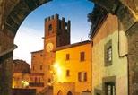 It is located in the Val d Orcia 12 kilometers northwest of Montalcino, in the Province of Siena, just 95 kilometers south of Florence and 200 kilometers north of