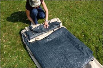 15) Now un-peg the groundsheet. Unless you are in the driest of dry conditions there will be condensation from the grass on the underside.