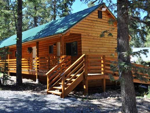 Accommodations The Inn Built in the picturesque log style, all eight nonsmoking suites offer a king size bed in the loft and a queen size sofa sleeper in the living room, a wood burning stove, a bath