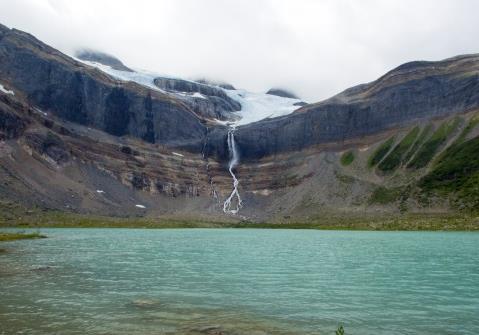 BULLEY GLACIER FALLS SPONSORS The Bulley Glacier Falls feed into a creek leading to a stunning turquoise lake.