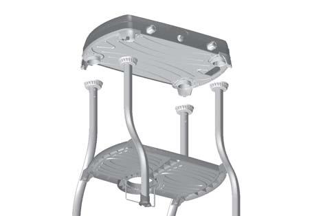 Bottom view of aluminium grill plates located to pot stands To assemble the utility tray to the legs, Clip all four fixing bosses on the utility tray into the Tray Clips on the legs.