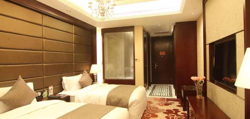 2 TANG DYNASTY WEST MARKET HOTEL 唐西市酒店 Offering 5-star luxury in downtown Xi an, Tang Dynasty West Market Hotel Xi an offers elegant rooms with traditional dark wood furnishings.