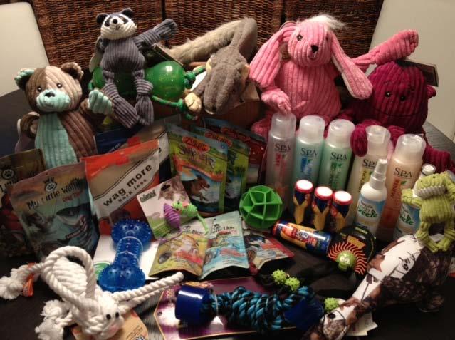 Auction Item #S30 Cutie Paws Pet Basket of Goodies designer spa bath products; famous name toys including plush, squeakers,