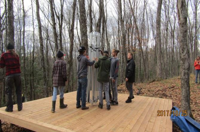 So, with student, teachers and equipment we ATV d and hiked into the forest to the location already framed out for the yurt and its decking.