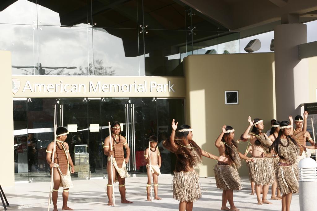 156 Micronesian Round-up Figure 2. Local dancers perform in front of the new Visitor Center at the Grand Opening Ceremony on May 28th, 2005.