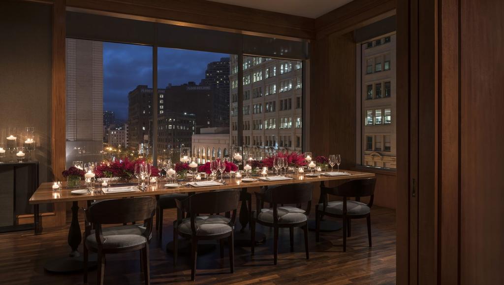 INTIMATE AND EXCLUSIVE With rich wood paneling and boasting elevated views over the Financial District, these distinctive, private dining spaces Private Den (PD3), Windows and View capitalize on MKT