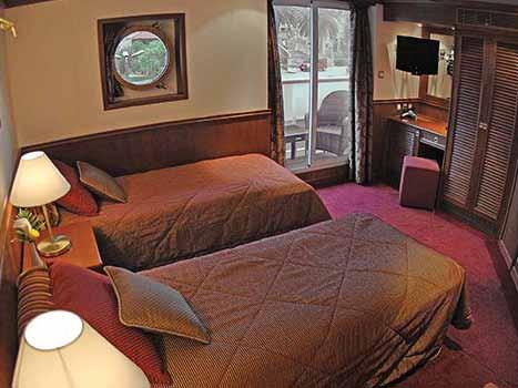 Cabins on the Upper and Main Decks have two twin beds which are convertible to a double bed; cabins on the Lower Deck have one twin bed.