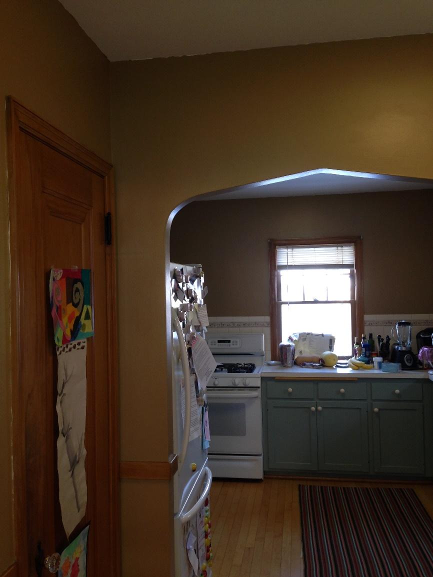 BEFORE PHOTO: #2 Hidden kitchen through arched