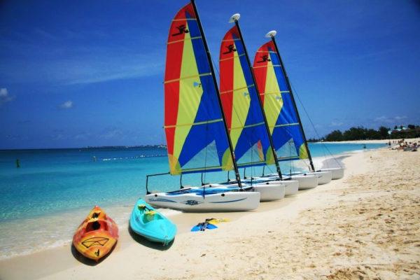 Sail the seas, swim with stingrays, or choose one of many watersports available on site. Contact Red Sail at (345) 949-8732 or visit www.redsailcayman.com.