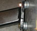 FIND IT NECESSARY TO SHIM THE TWO FORWARD MOST BOLTS ON THE TIEDOWN SO THAT IT DOES NOT INTERFERE WITH YOUR