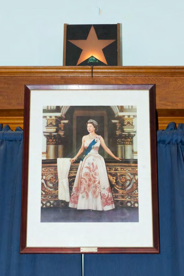 The Queen This Picture of Queen Elizabeth II hangs above the Masters Chair