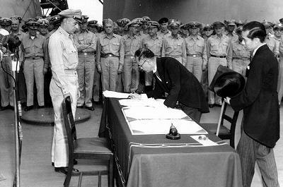 Japanese Delegate signing the