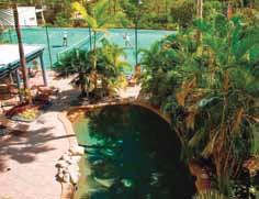 Take advantage of the palm fringed pool with its heated spa and barbecue area, or play a game of tennis.