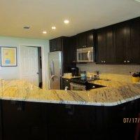 The kitchen has all stainless steel appliances, Flat Screen TV's in each room, new tile, and Free