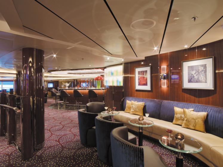 The Club The liveliest spot on board, The Club is a favorite spot for drinks and dancing both before and after dinner.