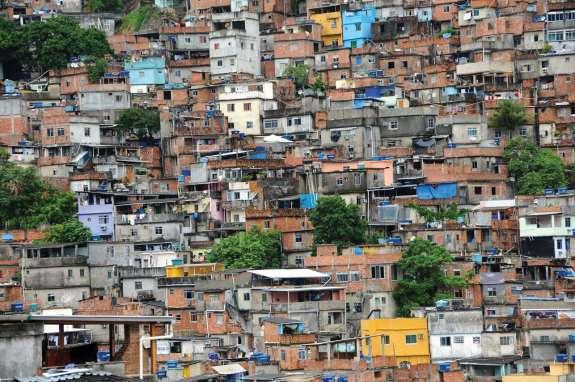 Figure 6.27 Favela La Rocinha, Rio de Janeiro, Brazil Favelas are usually self-constructed and start out as slums. Many lack ownership rights, police protection, or public services.