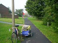 The towpath is soft grass which is unsuitable for cycling.