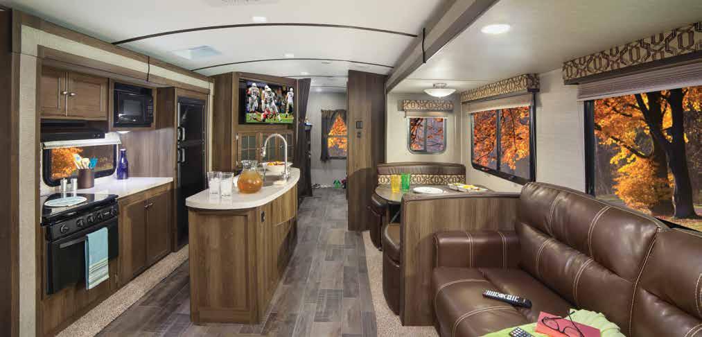PREMIER TRAVEL TRAILERS 34BHPR SHOWN IN SADDLEBROOK DECOR THE INDUSTRY'S FIRST LUXURY LIGHTWEIGHT TRAVEL TRAILER.