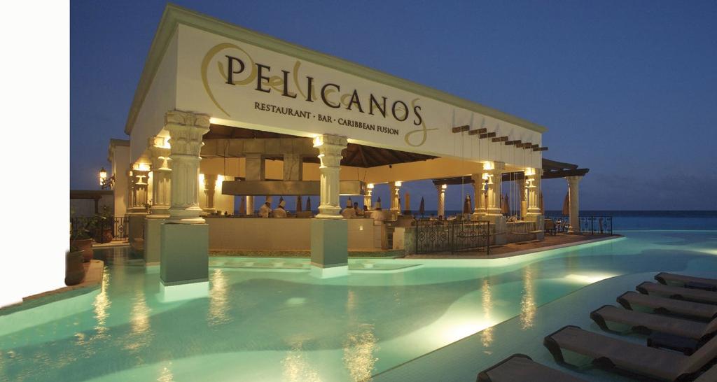 Pelicanos À la carte, International cuisine in an oceanfront setting by the infinity pool.