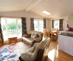 Acer lodge is situated on the Meadow overlooking the marina waters with a full sized double veranda facing South and West to ensure both day and