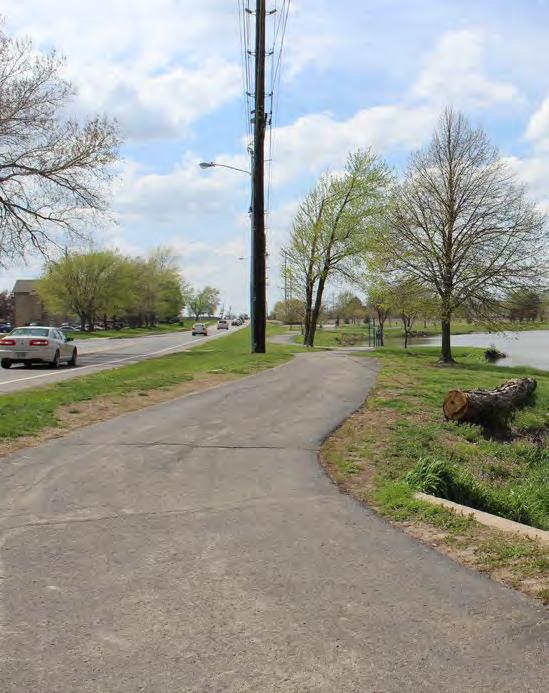 railroad lines at Keeler Street and Dennis Avenue present some safety issues CORRIDOR COECTIOS: Connects to Frisco Lake and its walking trails, playground, shelter and other park amenities