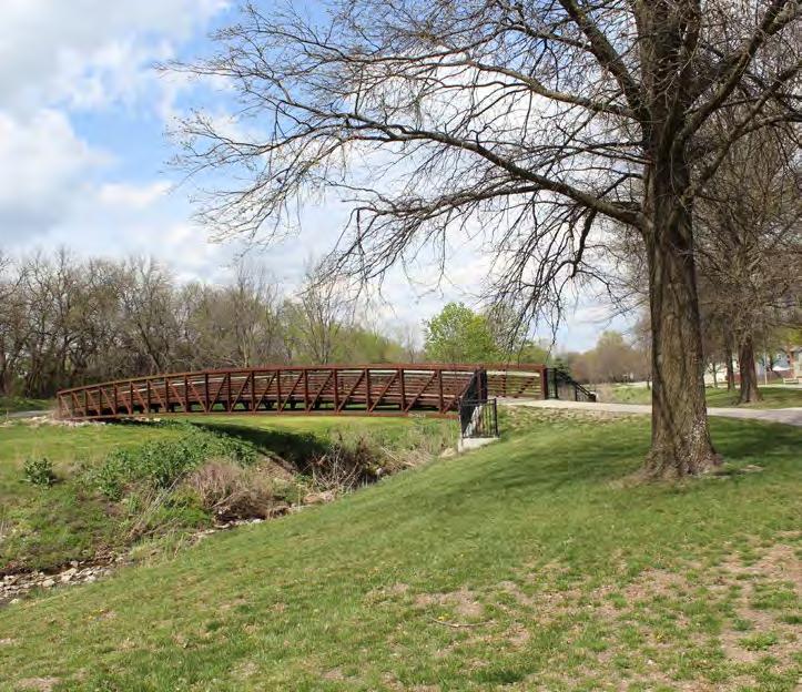 and Olathe South High School Connects to Indian Creek Trail north and south (segment 41), and side path on West 151st Street Parallels transit throughout its length OPPORTUITIES: Although it has very