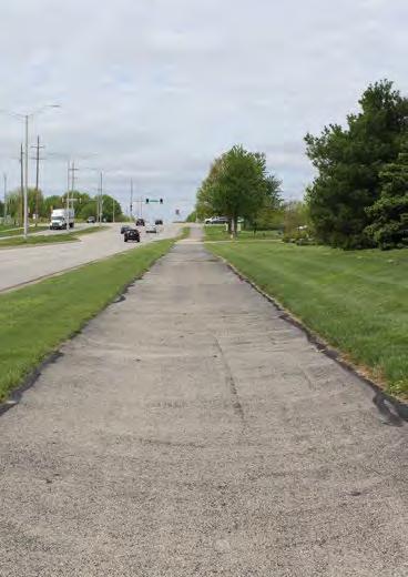 Although several neighborhood connections to the trail can be made from either side of the road, pedestrian crosswalks are located at one mile intervals or farther apart CORRIDOR
