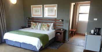 The spacious rooms at the lodge are equipped with a flat-screen TV, a small fridge, tea-and-coffee making facilities