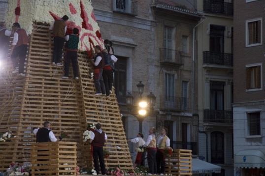 parade, and then mounts it, each on its own elaborate firecracker filled cardboard and paper