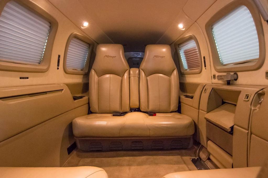 INTERIOR TAN LEATHER SEATS AND SIDE PANELS, CLUB SEATING, WRITING TABLE FORWARD REFRESHMENT CENTER/STORAGE DUAL 12
