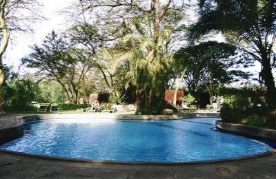 Safari Lodge Situated in the shadow of Mount Kilimanjaro, Africa's highest Mountain; besides