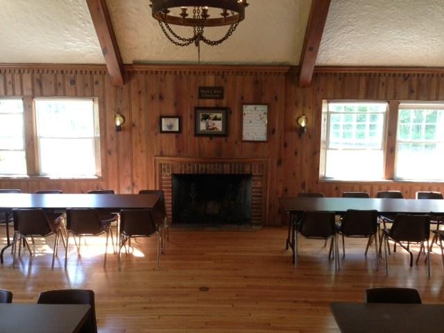 groove paneled walls and hardwood floors. The lodge is situated inside the West Shores Interpretive Center.