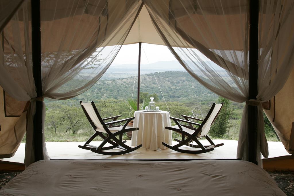 Cottar s 1920s Safari Camp provides the romance of safari under cream canvas tents, the style of the bygone era of the twenties with butlerdelivered silver service, while