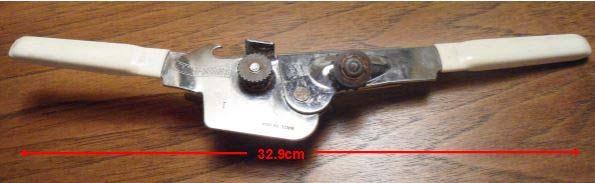 2. Description of Main Parts Figure 2 Front view, open The Swing-A-Way can opener consists of two main components: (1) the top lever and (2) the bottom lever (see Figure 3).