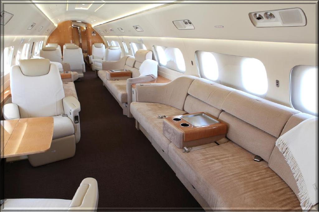 INTERIOR NEW 10/2010 EMBRAER Elegant nineteen (19) passenger fire-blocked interior upholstered in tan and brown leathers and fabrics - overall earth tones throughout with mixed to bamboo clear satin