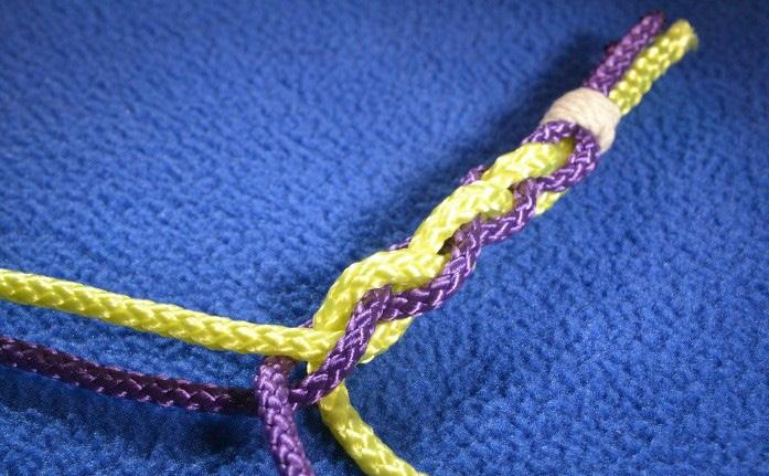 Every time you make a crossing, the right purple strand will go UNDER the left purple strand.