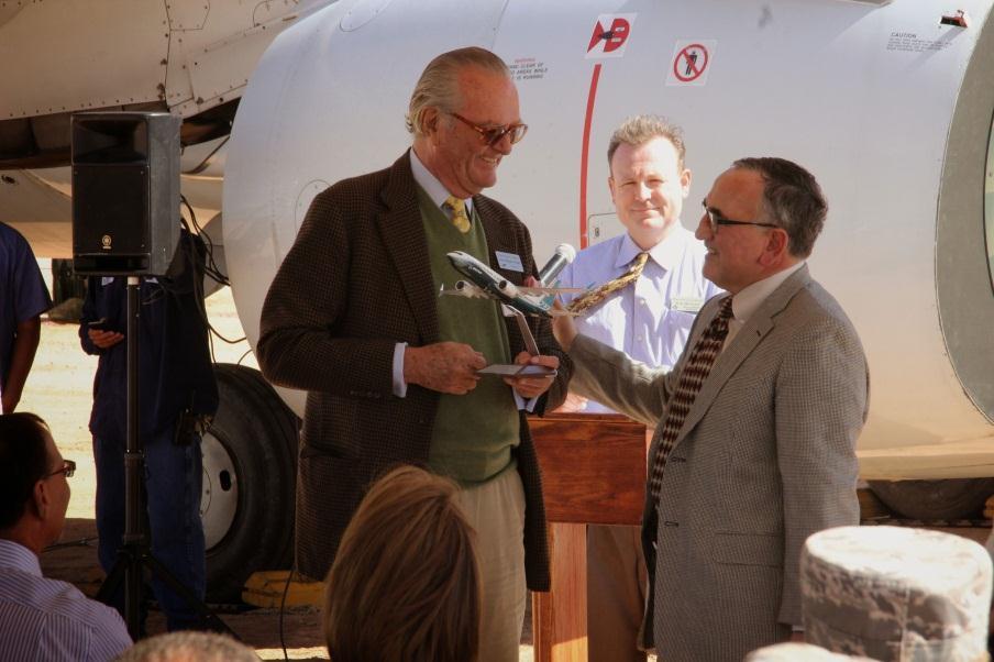 Count Ferdinand von Galen Board Chairman of the Arizona Aerospace Foundation that operates the Pima Air & Space Museum accepts a model from