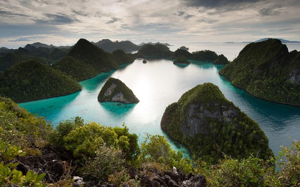 The islands of Wayag in the north of Raja Ampat (left); Mark (below) immoral, and rob coastal communities of the future of their fisheries and any tourism potential.
